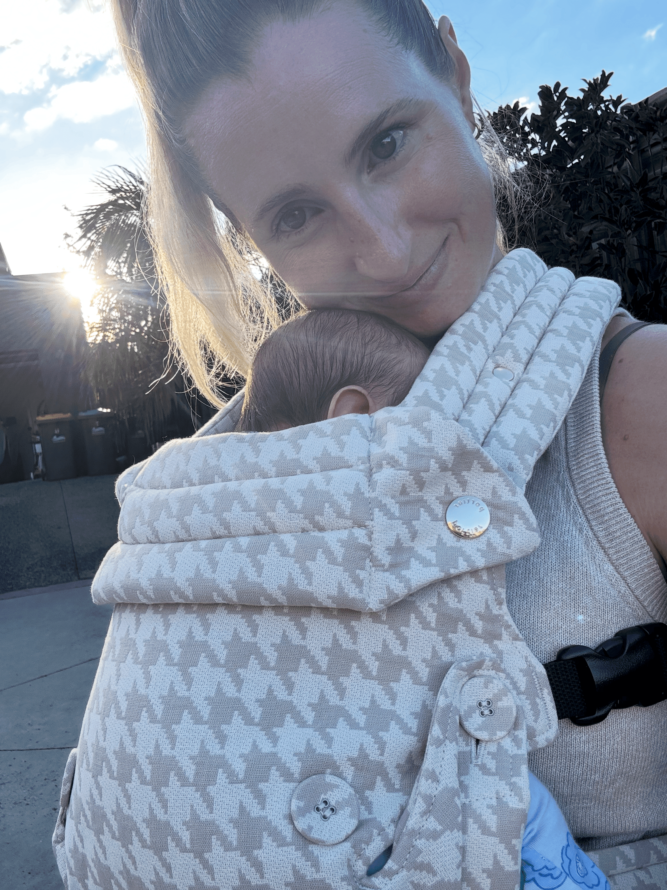 Jess with her newborn in a baby wrap - the contemplative moment